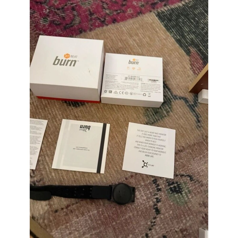 Orange theory heart monitor and box
